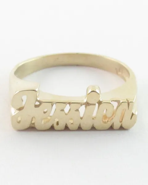 A 14k gold name ring with a first name in raised script letters