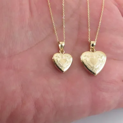 Two 14k gold floral heart picture lockets on fine chains