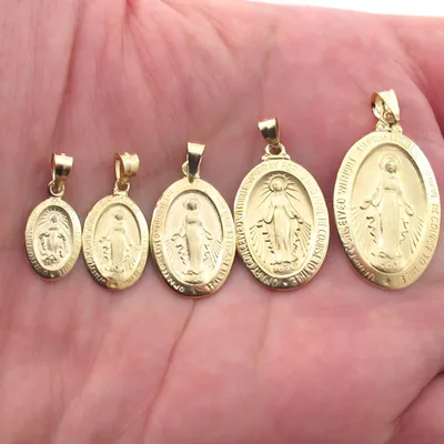 Five 14k gold Virgin Mary medals in a row, smallest to largest