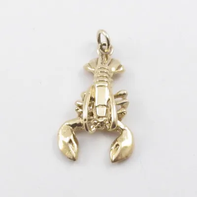 A vintage 14k gold movable lobster charm